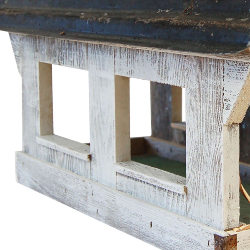 Wooden bird feeder with a white distressed finish on a white background

perch & weather