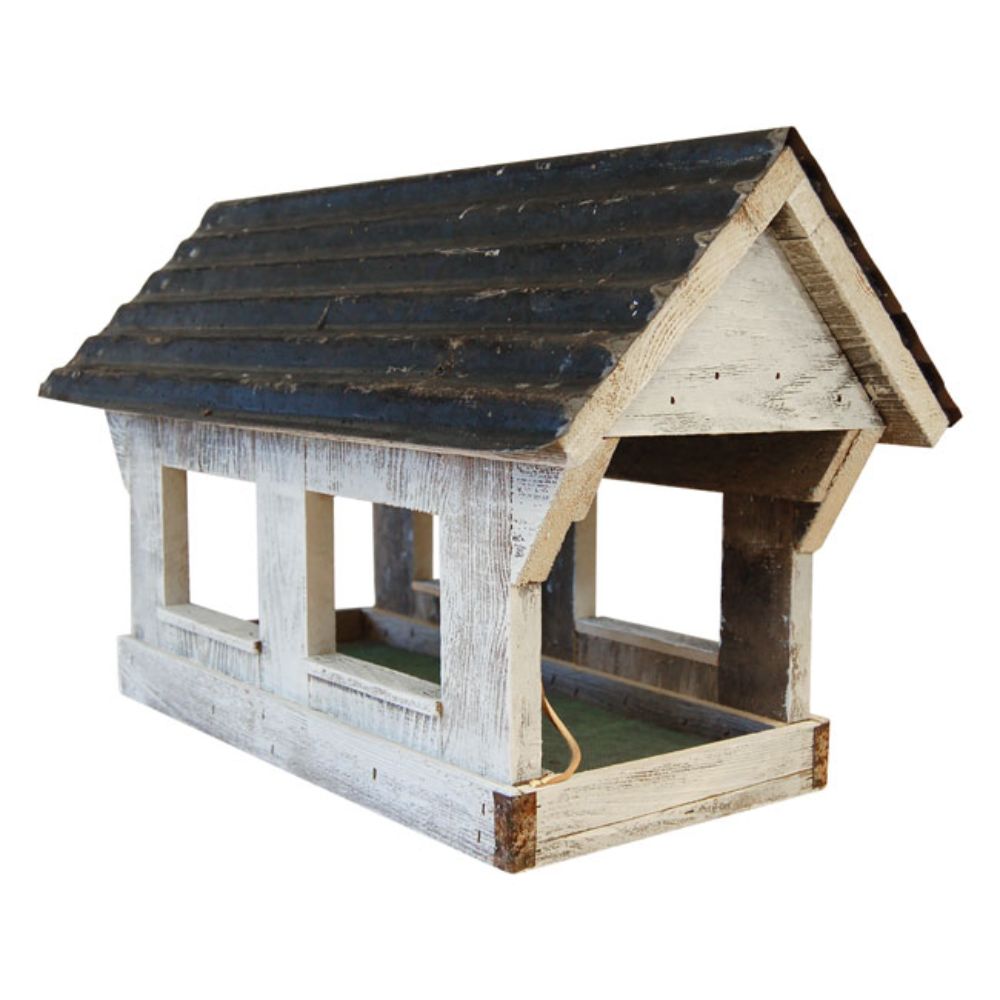 A rustic wooden birdhouse with a weathered white-painted body, a dark charcoal-brown shingled roof, and an open front porch, shown on a plain white background

perch & weather