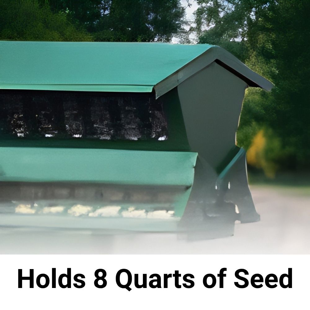 A green seed storage bin or cover with a slanted roof and open front, shown outdoors with blurred trees in the background. Text at the bottom reads 'Holds 8 Quarts of Seed'

perch & weather